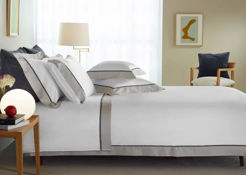 Oversized duvet covers that drape beautifully over the sides of the bed for a luxurious lookAmalia "Ovar" 430 Thread Count Duvet Cover in White with Grey Border Frame