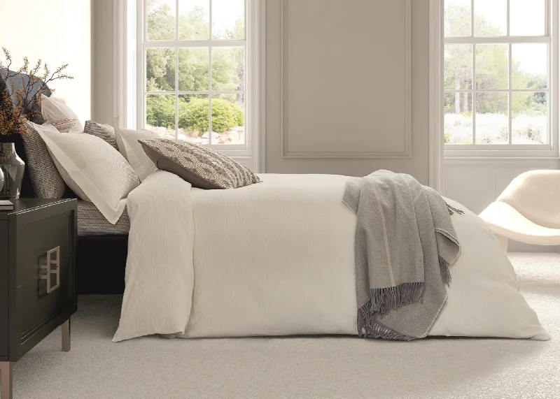 Solid - colored duvet covers in classic colors like white, black, and navy for a timeless lookBedeck of Belfast "Asha" Duvet Cover and Oxford Pillowcase in Chalk