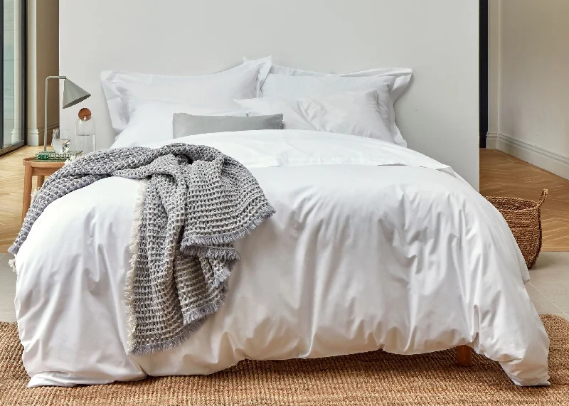 Linen duvet covers with a natural texture and breathabilityChristy "200TC Organic" Plain Dyed Sheets & Duvet Covers in White