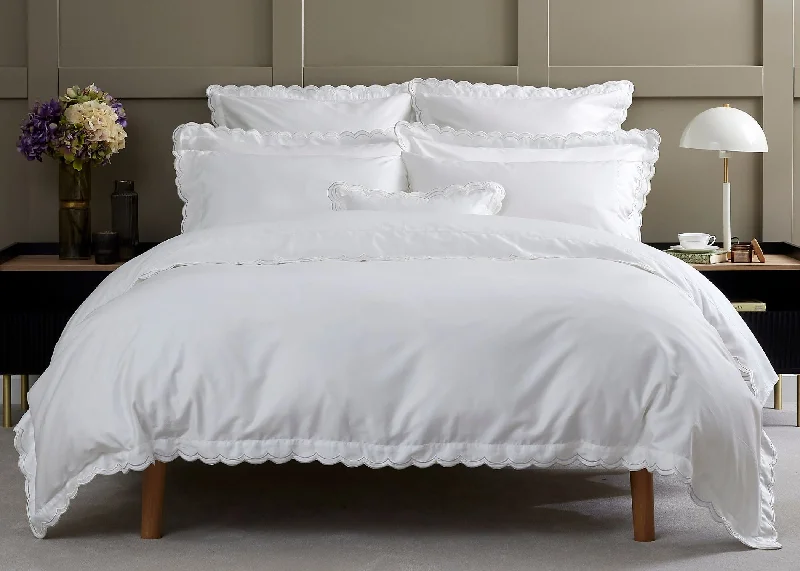 Solid - colored duvet covers in classic colors like white, black, and navy for a timeless lookChristy "Scallop Edge" Duvet Cover Sets in White