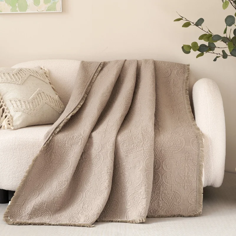 Linen blankets with a rustic and textured lookDaDa Bedding Elegant Fringed Cotton Quilted Throw Blanket - Luxurious Solid Soft Paisley Pattern, Cozy Lightweight Lap Throw, Perfect for Couch or Bed, Neutral Sandy Taupe Tan Beige, 50x60 Inches